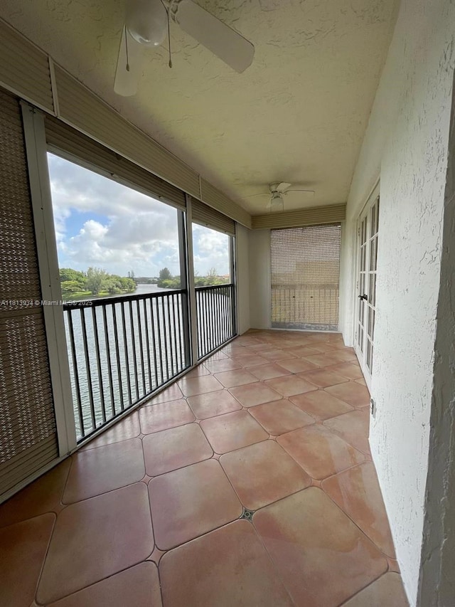 6575 W Oakland Park Blvd Unit 511, Lauderhill, FL 33313 - unfurnished sunroom featuring a ceiling fan