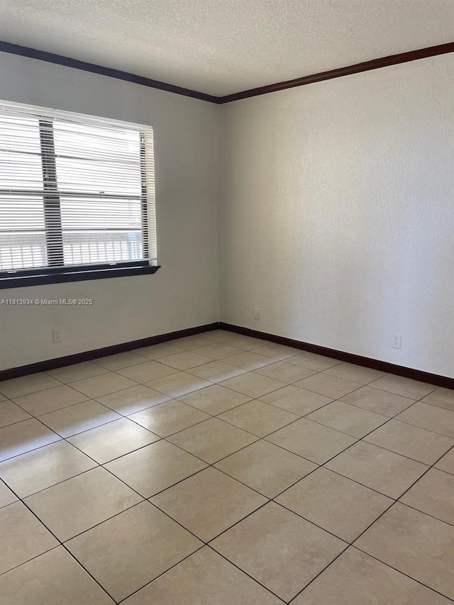 6575 W Oakland Park Blvd Unit 511, Lauderhill, FL 33313 - spare room with a textured ceiling, crown molding, and baseboards