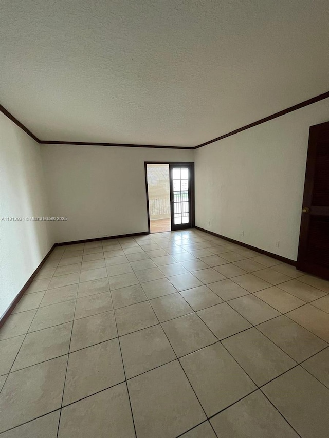 6575 W Oakland Park Blvd Unit 511, Lauderhill, FL 33313 - empty room with ornamental molding, light tile patterned flooring, baseboards, and a textured ceiling