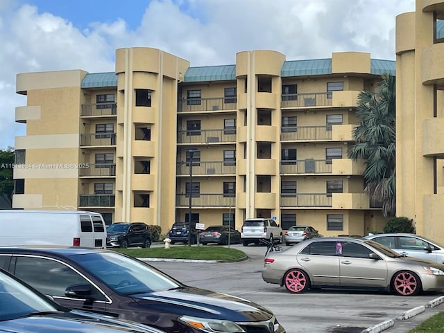 6575 W Oakland Park Blvd Unit 511, Lauderhill, FL 33313 - view of apartment building / complex featuring uncovered parking