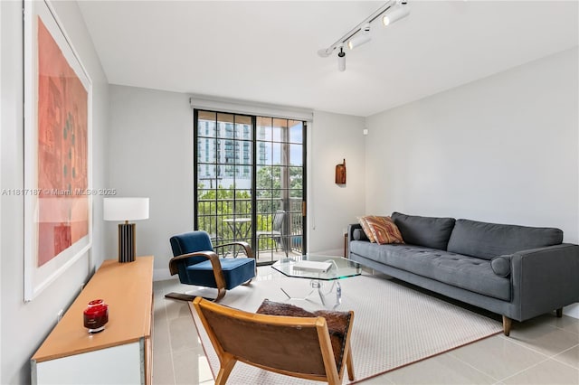 1900 Van Buren St Unit 407B, Hollywood, FL 33020 - living area featuring light tile patterned floors and track lighting