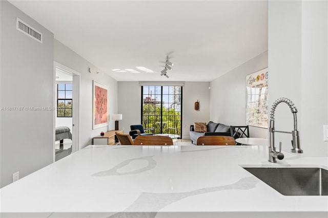 1900 Van Buren St Unit 407B, Hollywood, FL 33020 - bedroom with a sink and rail lighting