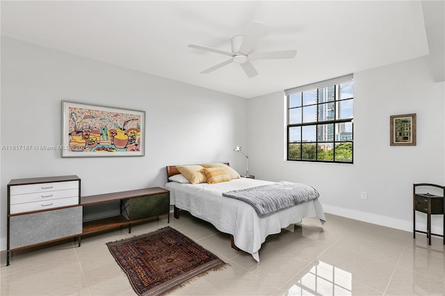 1900 Van Buren St Unit 407B, Hollywood, FL 33020 - bedroom featuring light tile patterned floors and ceiling fan