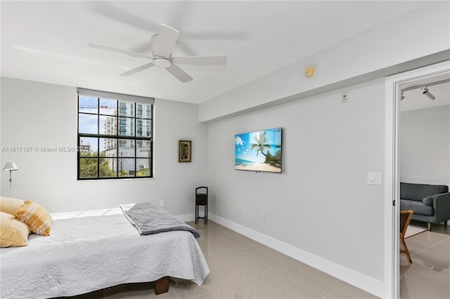 1900 Van Buren St Unit 407B, Hollywood, FL 33020 - bedroom featuring ceiling fan and light tile patterned floors