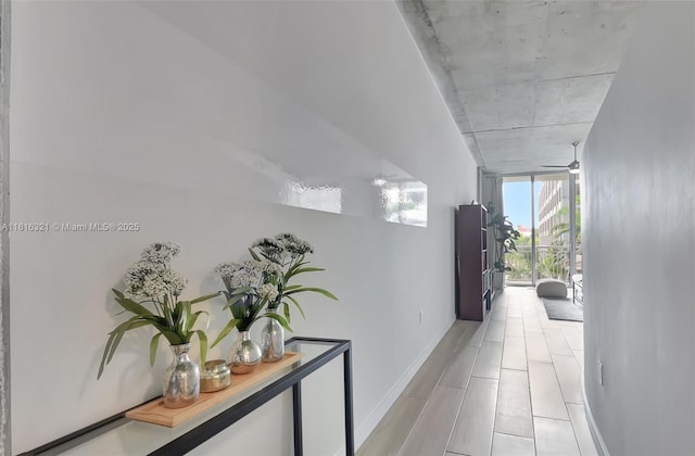 300 S Australian Ave Unit 302, West Palm Beach, FL 33401 - corridor with expansive windows and baseboards