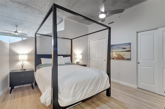 300 S Australian Ave Unit 302, West Palm Beach, FL 33401 - bedroom featuring baseboards and light wood finished floors