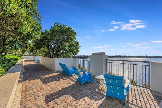 300 S Australian Ave Unit 302, West Palm Beach, FL 33401 - view of patio / terrace featuring a water view