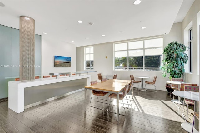 300 S Australian Ave Unit 302, West Palm Beach, FL 33401 - dining area featuring wood finished floors, recessed lighting, and baseboards