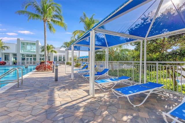 300 S Australian Ave Unit 302, West Palm Beach, FL 33401 - view of patio with a community pool