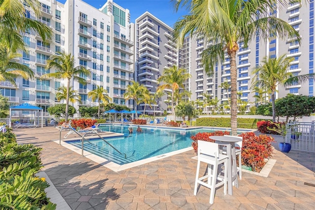 300 S Australian Ave Unit 302, West Palm Beach, FL 33401 - community pool featuring a patio