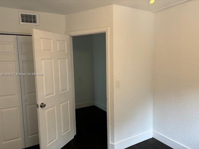 248 NW 69th St, Miami, FL 33150 - unfurnished room with baseboards