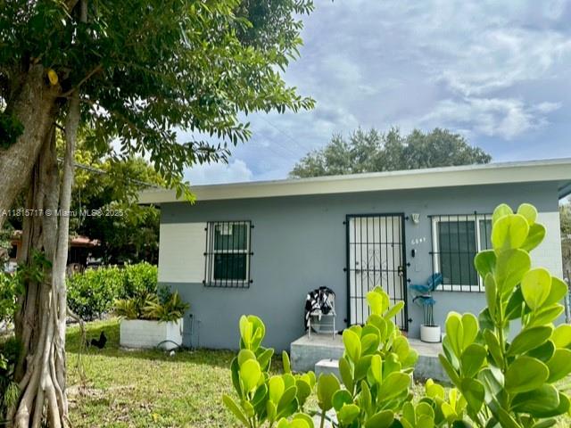 248 NW 69th St, Miami, FL 33150 - view of front of property featuring stucco siding