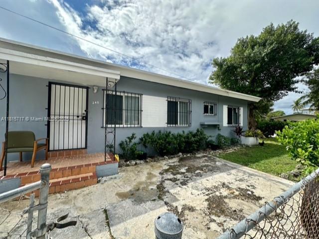248 NW 69th St, Miami, FL 33150 - bungalow with stucco siding