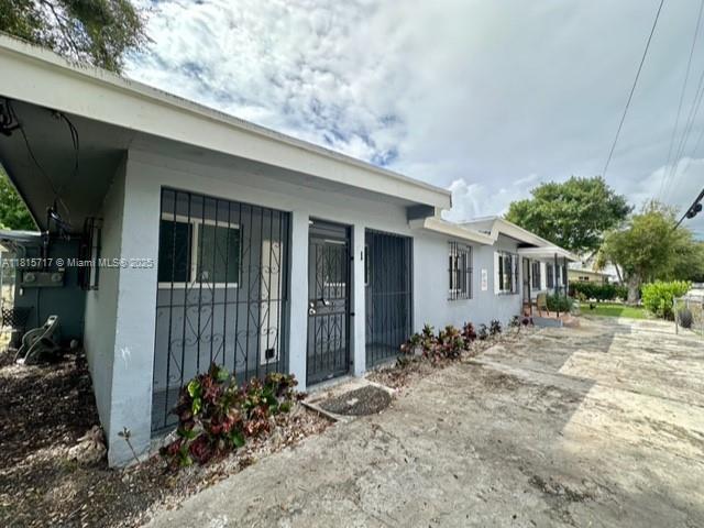 248 NW 69th St, Miami, FL 33150 - view of property exterior with stucco siding