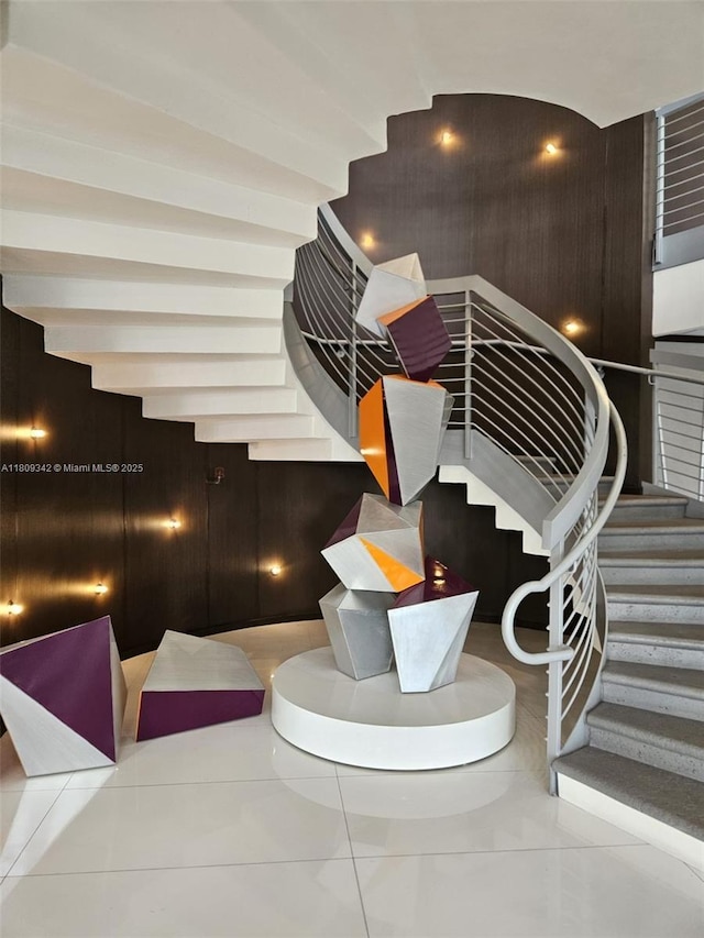 5701 E Collins Ave Unit Ph10, Miami Beach, FL 33140 - staircase featuring tile patterned flooring