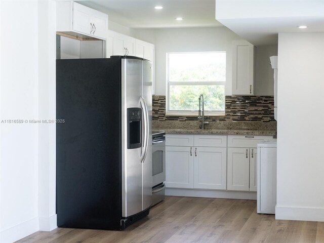 3613 SW 12th Pl, Fort Lauderdale, FL 33312 - kitchen with stainless steel appliances, light stone counters, tasteful backsplash, a sink, and recessed lighting