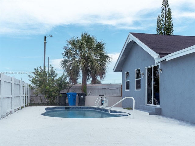3613 SW 12th Pl, Fort Lauderdale, FL 33312 - rear view of house with a patio and stucco siding