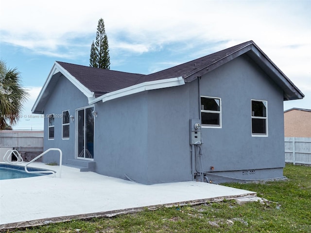 3613 SW 12th Pl, Fort Lauderdale, FL 33312 - rear view of property with a patio area, stucco siding, and entry steps
