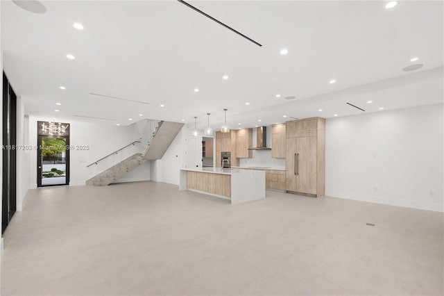 8811 SW 56th St, Miami, FL 33165 - unfurnished living room with stairs, recessed lighting, concrete floors, and baseboards