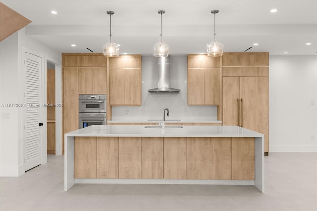 8811 SW 56th St, Miami, FL 33165 - kitchen featuring wall chimney range hood, a sink, light countertops, recessed lighting, and stainless steel double oven