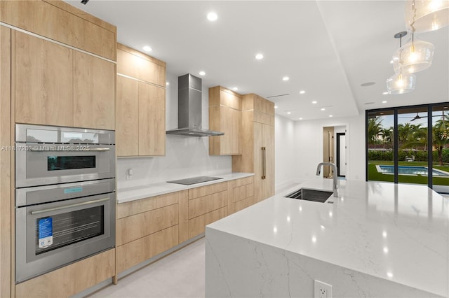 8811 SW 56th St, Miami, FL 33165 - kitchen featuring wall chimney exhaust hood, a sink, light brown cabinetry, double oven, and recessed lighting
