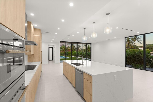 8811 SW 56th St, Miami, FL 33165 - kitchen featuring modern cabinets, a sink, dishwasher, light brown cabinets, and recessed lighting