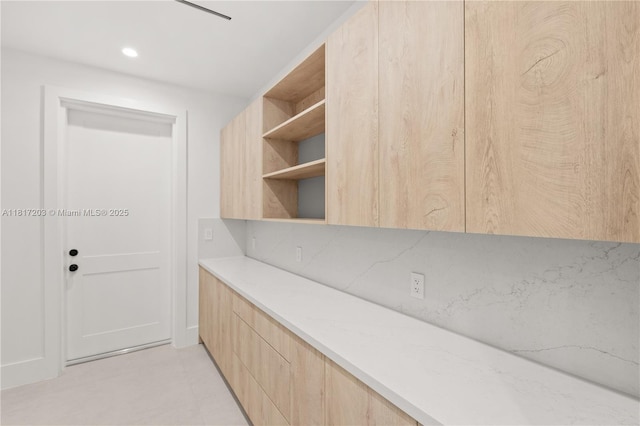 8811 SW 56th St, Miami, FL 33165 - kitchen featuring open shelves, light brown cabinets, modern cabinets, light countertops, and recessed lighting