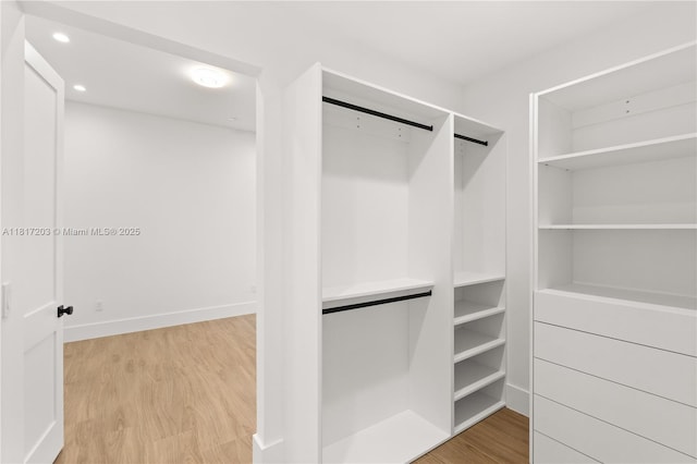 8811 SW 56th St, Miami, FL 33165 - walk in closet with wood finished floors