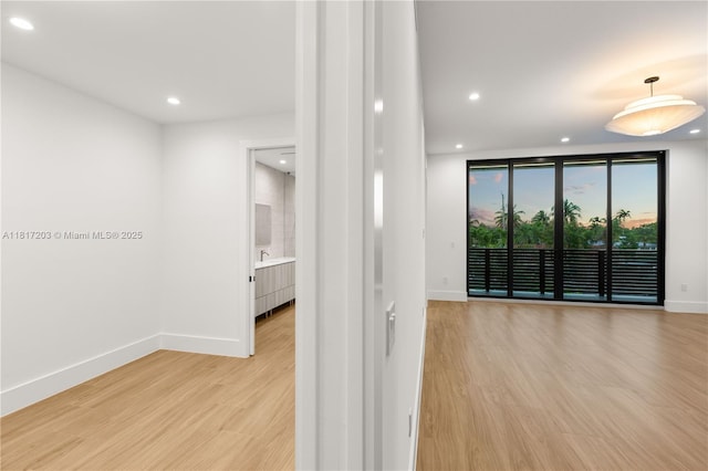 8811 SW 56th St, Miami, FL 33165 - empty room with baseboards, light wood-style flooring, and recessed lighting