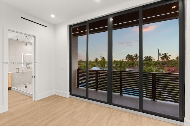 8811 SW 56th St, Miami, FL 33165 - empty room with wood finished floors, baseboards, and recessed lighting