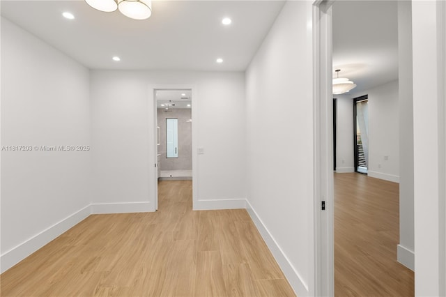 8811 SW 56th St, Miami, FL 33165 - hallway featuring light wood-style floors, baseboards, and recessed lighting