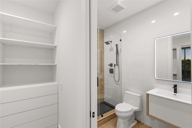 8811 SW 56th St, Miami, FL 33165 - full bath featuring vanity, a stall shower, toilet, and wood finished floors