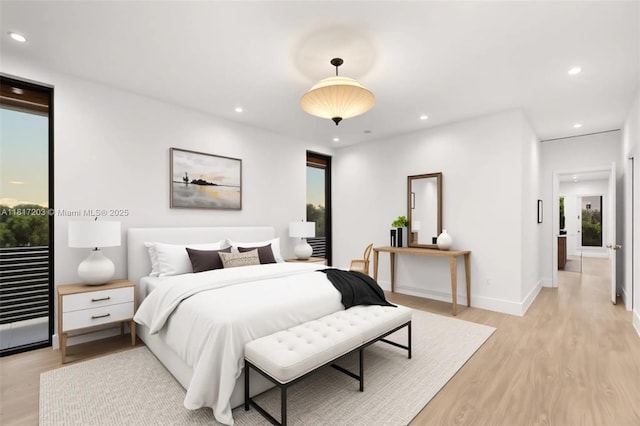8811 SW 56th St, Miami, FL 33165 - bedroom with light wood-type flooring, recessed lighting, and baseboards
