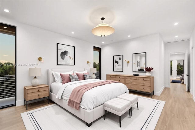 8811 SW 56th St, Miami, FL 33165 - bedroom with light wood finished floors, baseboards, and recessed lighting