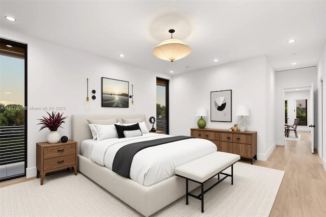 8811 SW 56th St, Miami, FL 33165 - bedroom with light wood-type flooring, recessed lighting, baseboards, and multiple windows