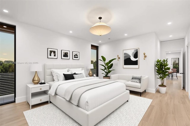 8811 SW 56th St, Miami, FL 33165 - bedroom featuring light wood-style flooring, baseboards, and recessed lighting