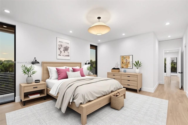 8811 SW 56th St, Miami, FL 33165 - bedroom featuring light wood-type flooring, recessed lighting, and baseboards