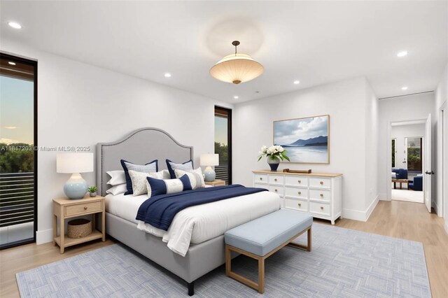8811 SW 56th St, Miami, FL 33165 - bedroom featuring light wood-style flooring, recessed lighting, and baseboards