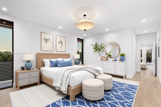 8811 SW 56th St, Miami, FL 33165 - bedroom with light wood-type flooring, recessed lighting, and baseboards