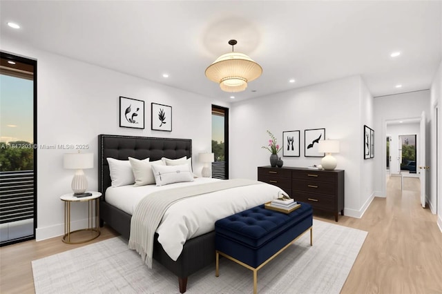 8811 SW 56th St, Miami, FL 33165 - bedroom featuring multiple windows, light wood-style flooring, baseboards, and recessed lighting