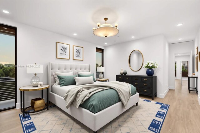 8811 SW 56th St, Miami, FL 33165 - bedroom featuring light wood-style flooring, recessed lighting, and baseboards