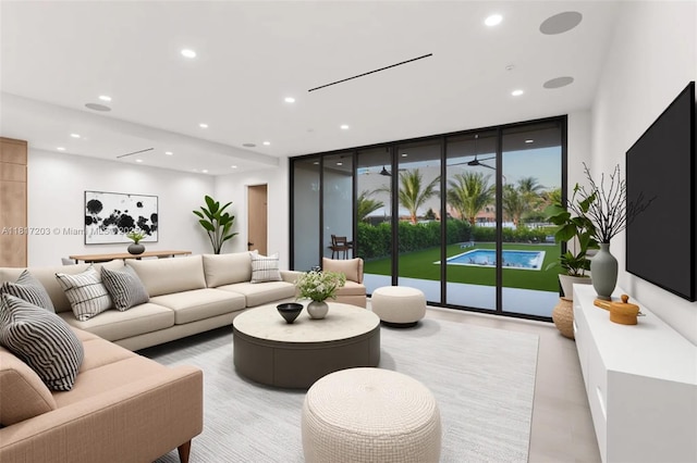 8811 SW 56th St, Miami, FL 33165 - living room featuring recessed lighting and floor to ceiling windows