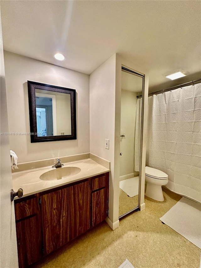 4306 43rd Way, West Palm Beach, FL 33407 - full bathroom with vanity, a shower with shower curtain, and toilet