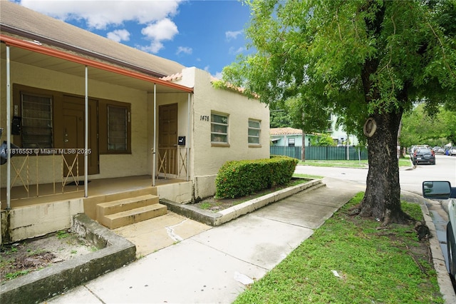 1478 SW 2nd St, Miami, FL 33135 - property entrance with stucco siding