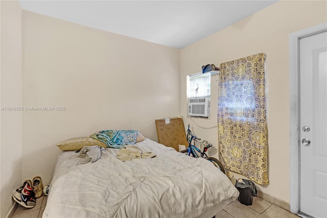 1478 SW 2nd St, Miami, FL 33135 - bedroom with light tile patterned floors and baseboards