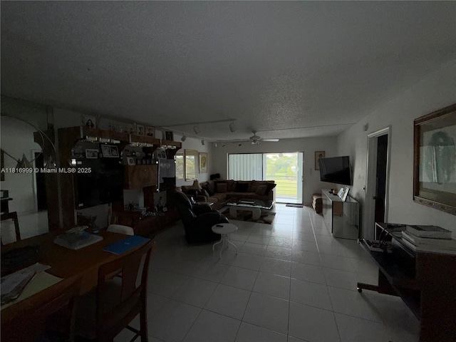 3581 Inverrary Dr Unit 410, Lauderhill, FL 33319 - living room with tile patterned floors, a textured ceiling, ceiling fan, and rail lighting