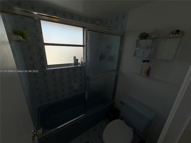 3581 Inverrary Dr Unit 410, Lauderhill, FL 33319 - bathroom with bath / shower combo with glass door and toilet