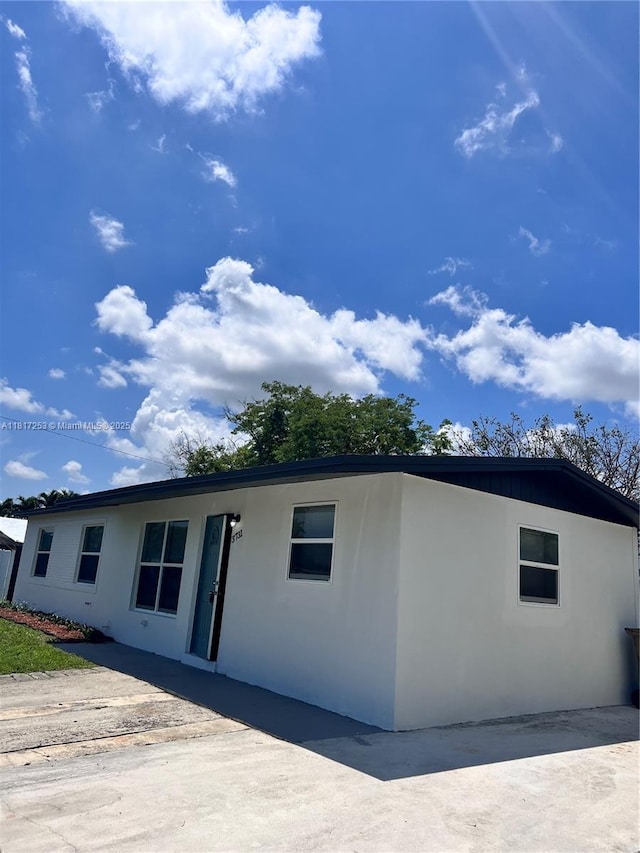 3731 SW 58th Ter, Davie, FL 33314 - view of front facade featuring stucco siding