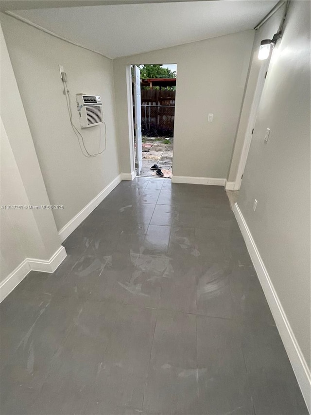 3731 SW 58th Ter, Davie, FL 33314 - hallway featuring an AC wall unit and baseboards