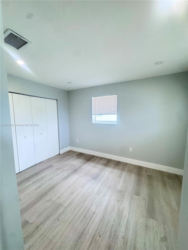 3731 SW 58th Ter, Davie, FL 33314 - unfurnished bedroom featuring wood finished floors and a closet